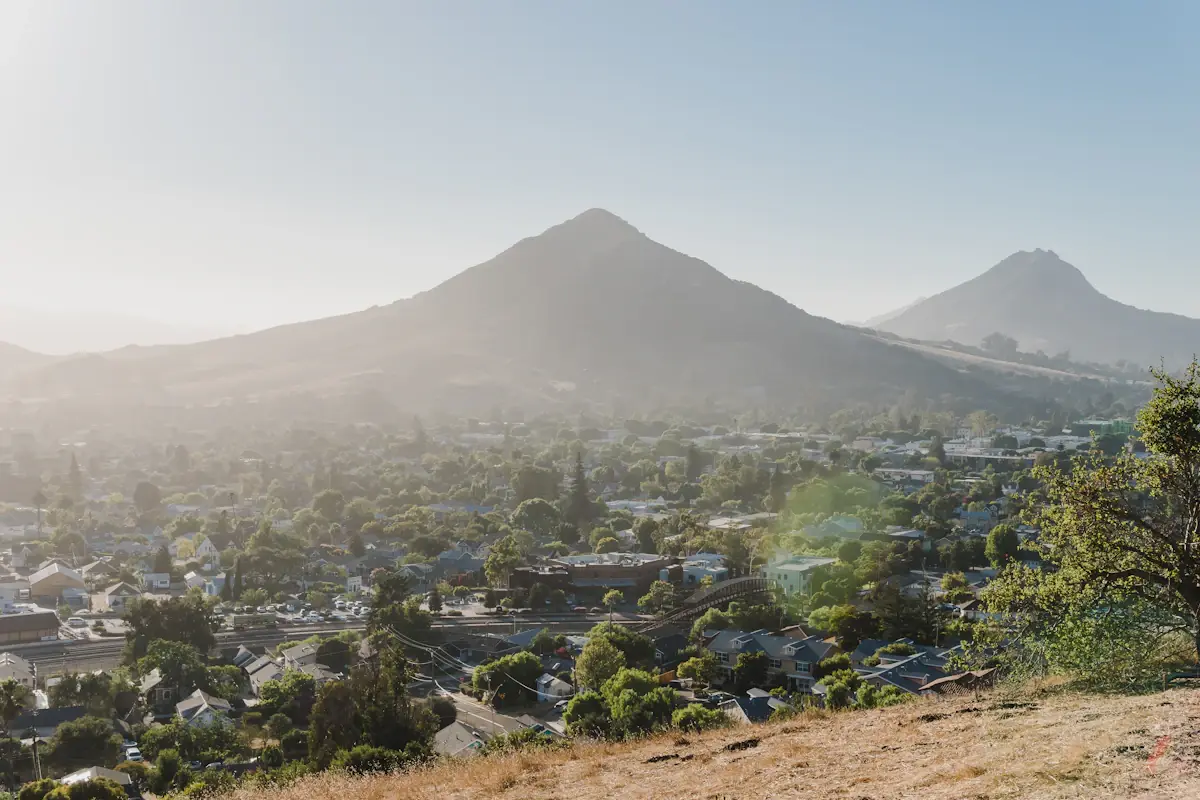 San Luis Obispo homes spread below the Morros on a hazy morning